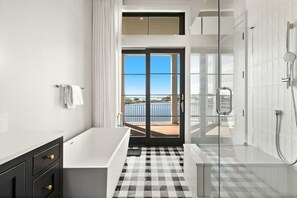 Shower, hair dryer, towels, shampoo