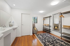 Combined shower/tub, hair dryer, towels, toilet paper