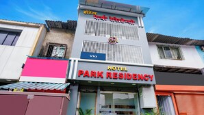 A hotel with a sign indicating 'HOTEL PARK RESIDENCY' and a logo above the entrance. - Fabexpress Park Residency (Mumbai)