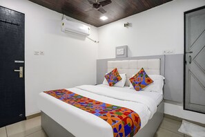 Habitación Deluxe | Sábanas de algodón egipcio, ropa de cama de alta calidad, caja fuerte