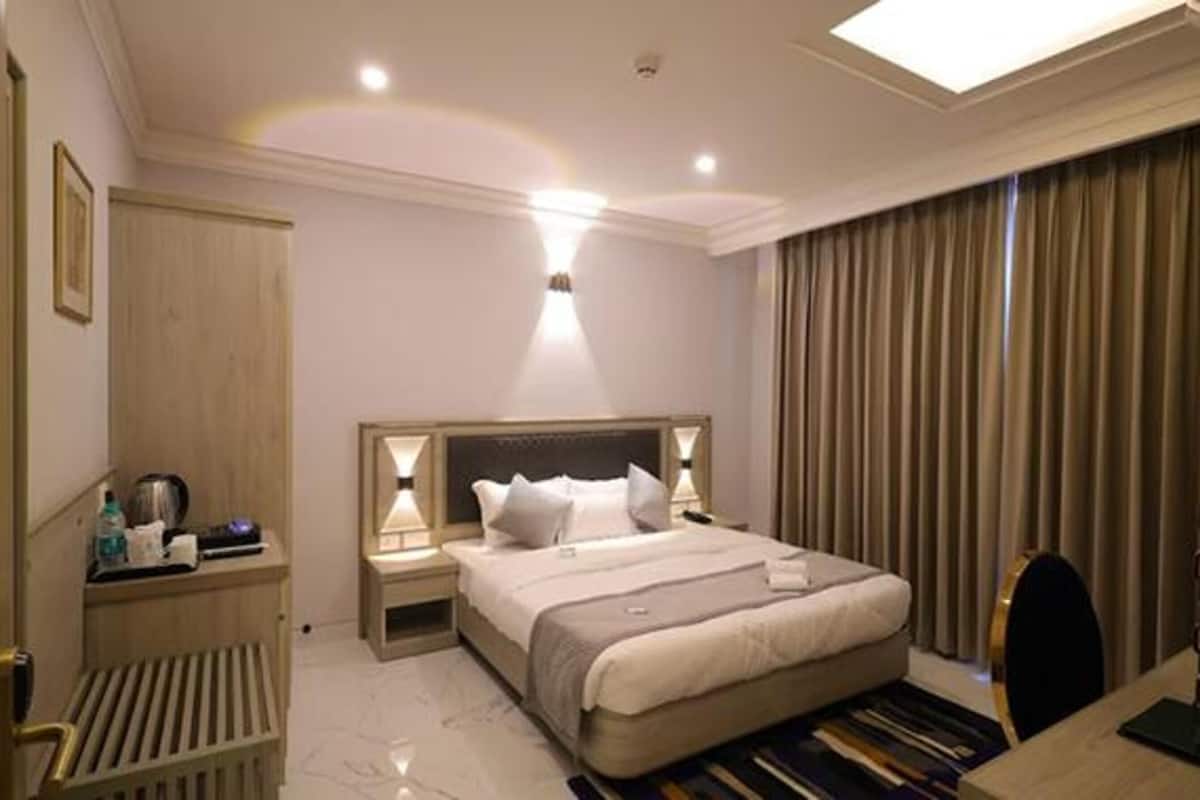 Habitación Premium | Sábanas de algodón egipcio y ropa de cama de alta calidad