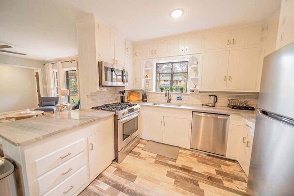 Dishwasher, coffee/tea maker, high chair, cookware/dishes/utensils