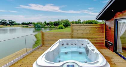 Superb bespoke lodge with two bedrooms sleeping up to four people.