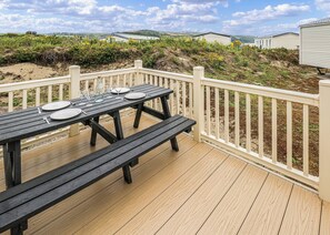 Outdoor dining - Large 12ft-wide caravan with one double with en suite W. (Cardigan)