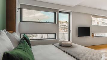 1 bedroom, desk, iron/ironing board, travel crib