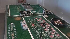 A craps table with chips, dice, and a dealer button. - SizzlingSummerRates@TheWhiteHouse (Carrum Downs)