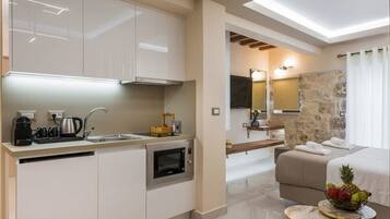 Fridge, microwave, stovetop, coffee/tea maker