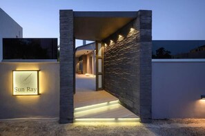 Welcome to Sun Ray, where sleek lines and geometric shapes create a clean, minimalist entrance.