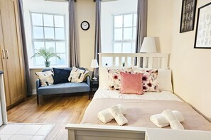 Iron/ironing board, travel crib, WiFi, bed sheets