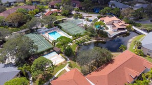 Residents can enjoy a swim in the pool or play a game of tennis on one of two courts.