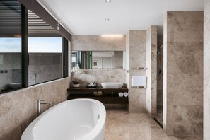 Bathtub, hair dryer, towels