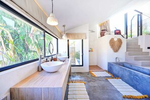 Bathtub, hair dryer, towels