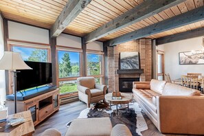 TV, fireplace - Walk to Gondola | Cozy 2BR Condo | Pool, Hot Tubs and Fireplace! (Steamboat Springs)