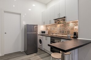 Kjøleskap, mikrobølgeovn, ovn og oppvaskmaskin