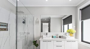 Bathtub, hair dryer, towels