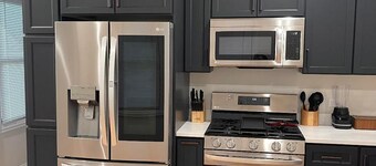 5-minute walk to the largest old school arcade in America! Family friendly.