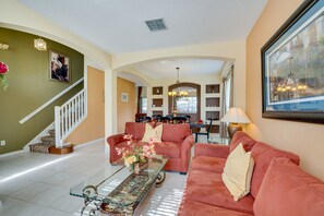 TV, books - Spacious Kissimmee Vacation Rental w/ Private Pool (Kissimmee)