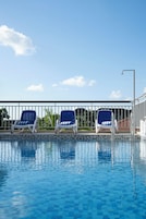 Outdoor pool, open 6:00 AM to 7:00 PM, sun loungers