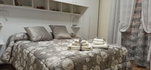 2 dormitorios, tabla de planchar con plancha, wifi y ropa de cama