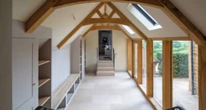 Cotswold countryside escape with natural swimming pool, gym, sleeps 14 guests