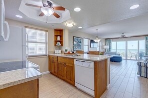 Microwave, dishwasher, coffee/tea maker, cookware/dishes/utensils