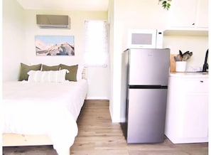 1 chambre, coffre-fort, fer et planche à repasser
