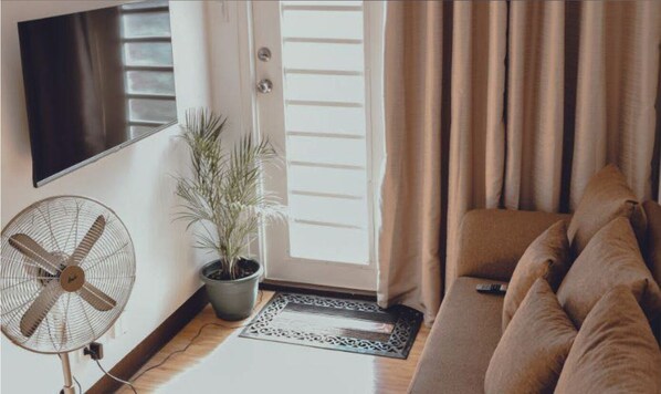 Living area - Welcome to AiPad!

Step into a world of Aesthetic 1BR Condo Getaway.  (Davao City)