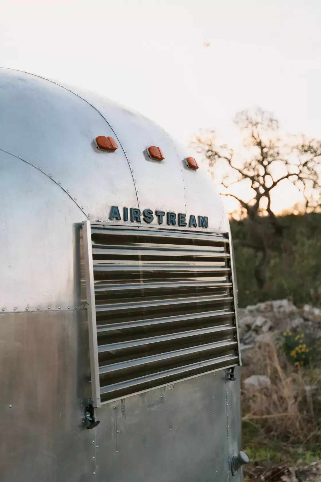 A trailer with the brand name "AIRSTREAM" on its side.