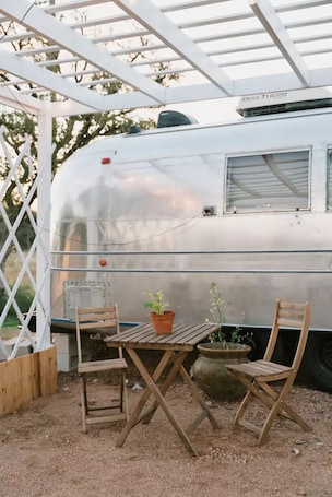 Outdoor dining. Vintage Airstream