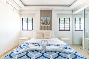 3 habitaciones, tabla de planchar con plancha y cuna de viaje