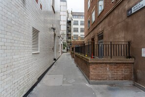Stroll through this charming alleyway lined with historic buildings.