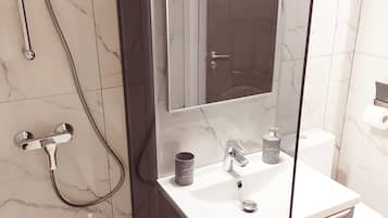 Dusj, hårføner, bidé og håndklær