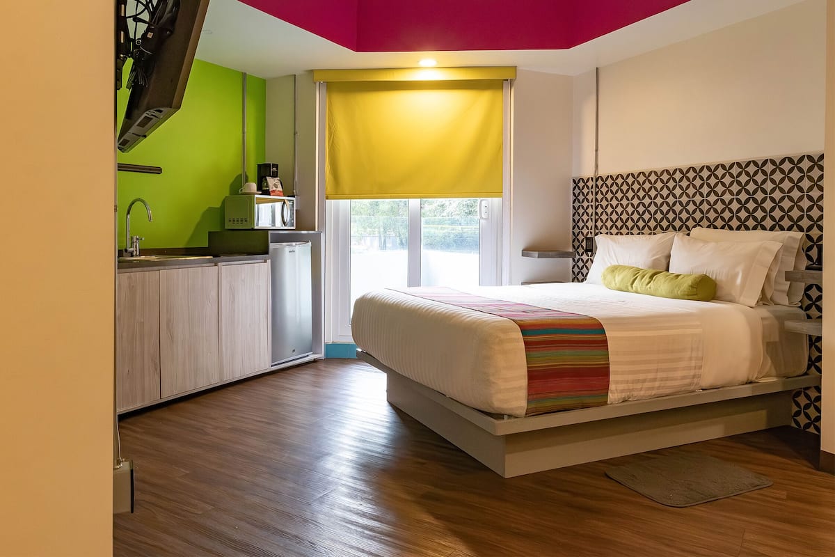 Suíte, 1 cama Queen, para não fumantes, sacada | Sacada