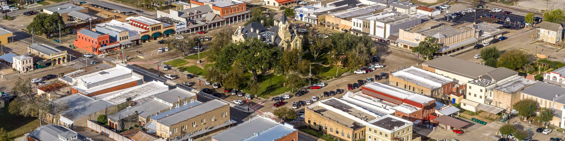 La Grange, Texas, USA - December 2, 2025 Aerial view of West Travis Street, La Grange on an overcast fall afternoon.