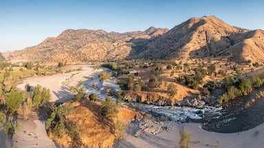 Aerial view of Scenic Valley landscape in California, USA. Winding river through the valley.
Calm waters flow peacefully through a valley in the California river canyon. Sunny weather in summer time.