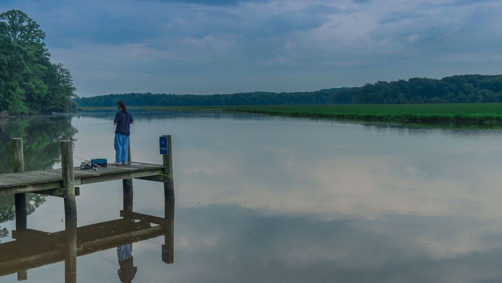La Plata, Maryland, USA - Jun 2, 2018: Sunset on a quiet lake in a Maryland park