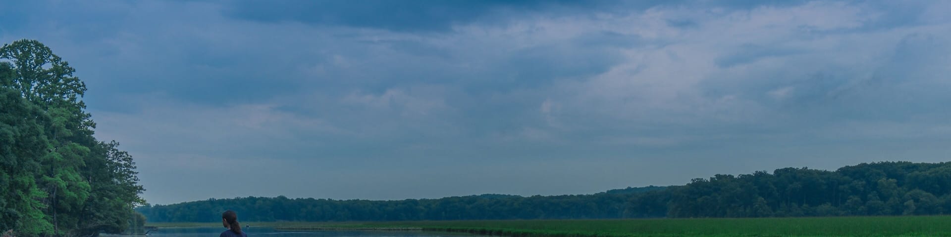 La Plata, Maryland, USA - Jun 2, 2018: Sunset on a quiet lake in a Maryland park