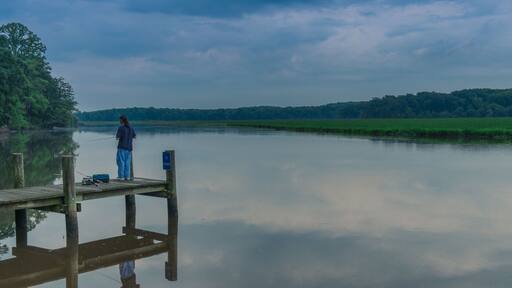 La Plata, Maryland, USA - Jun 2, 2018: Sunset on a quiet lake in a Maryland park