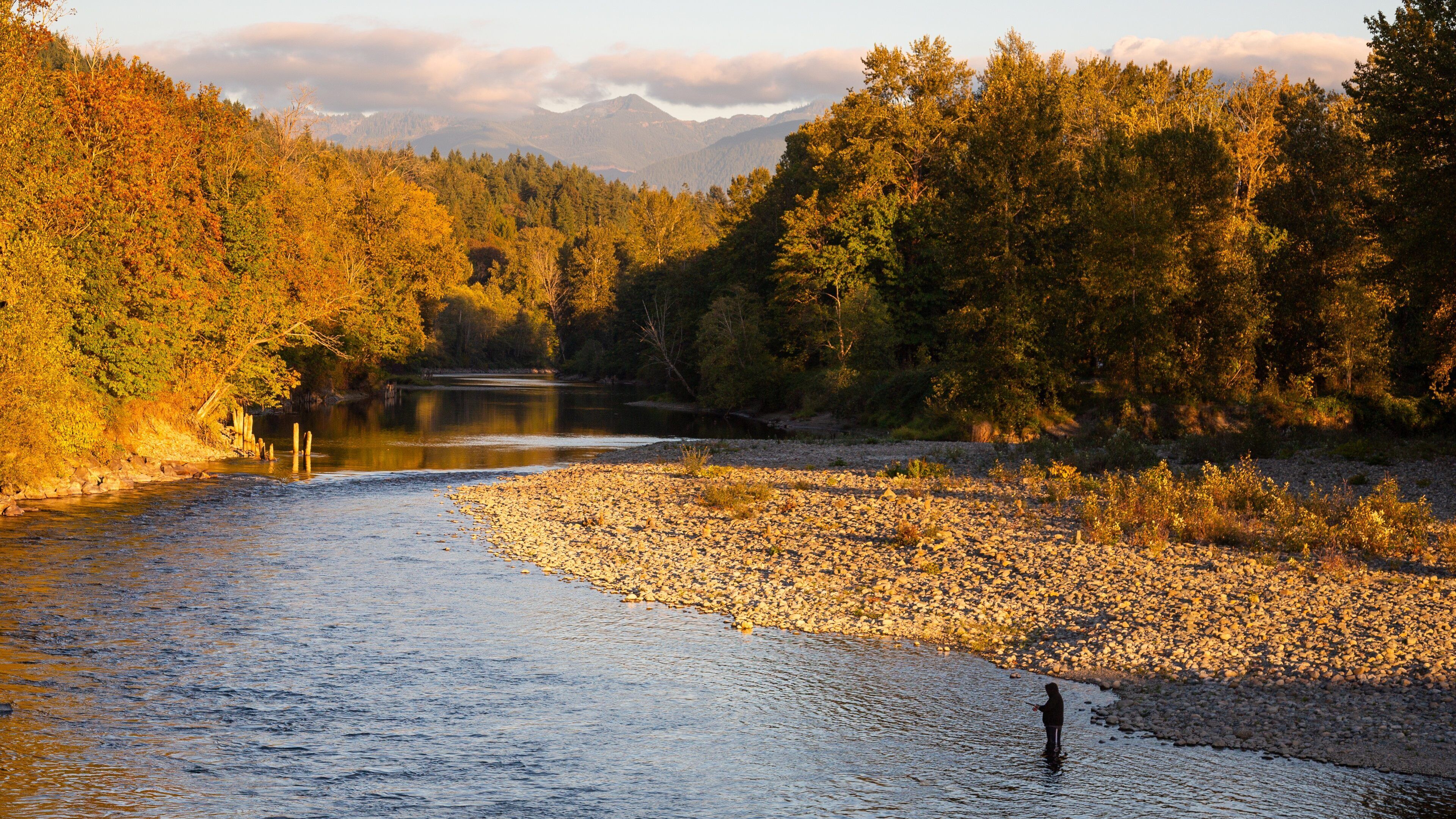 Snoqualmie which includes a river or creek, a sunset and forests