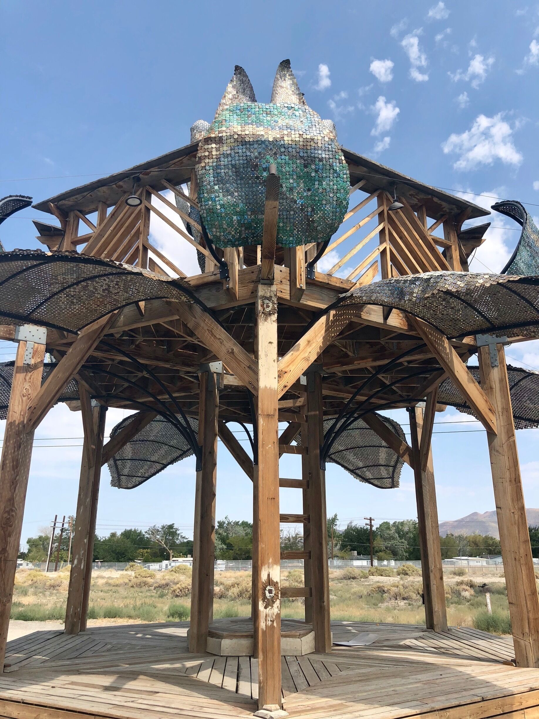 Made of reclaimed wood, steel and 75,000 flattened  bottle caps obtained from over 50 bars around the world, this is the bottlecap gazebo. 