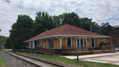 Built in 1906 Tryon's train depot is now an event space and the tracks are no longer in use.