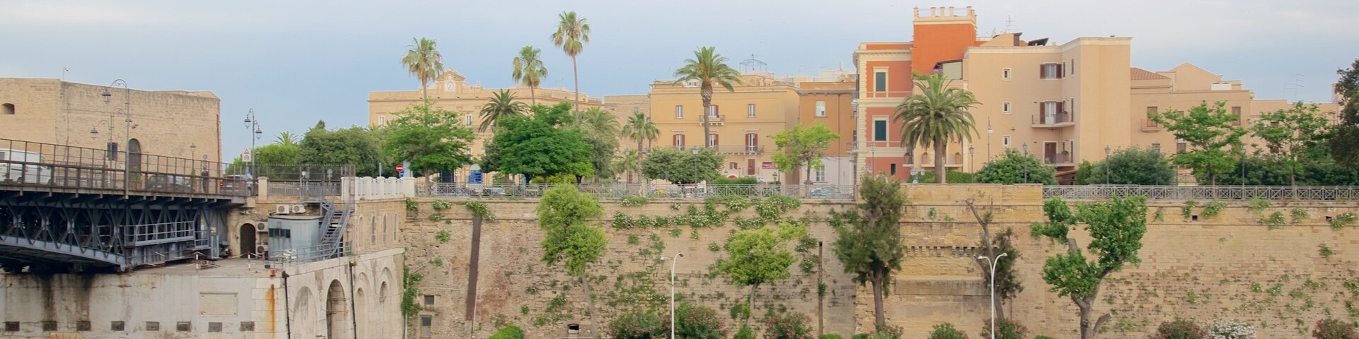 Taranto which includes a city and a river or creek