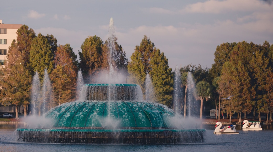 The lake Eola fountain in downtown orlando florida in central florida Lake Eola Park is located in the heart of Downtown Orlando, with a sidewalk that circles the lake .9 miles in length