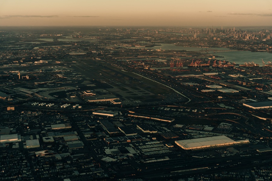 view of new york and new jersey from the plane on sunset