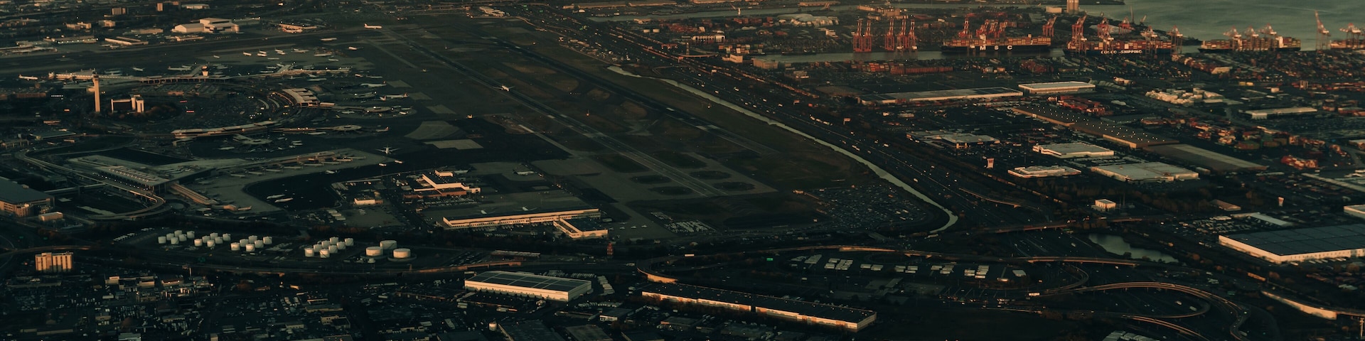 view of new york and new jersey from the plane on sunset