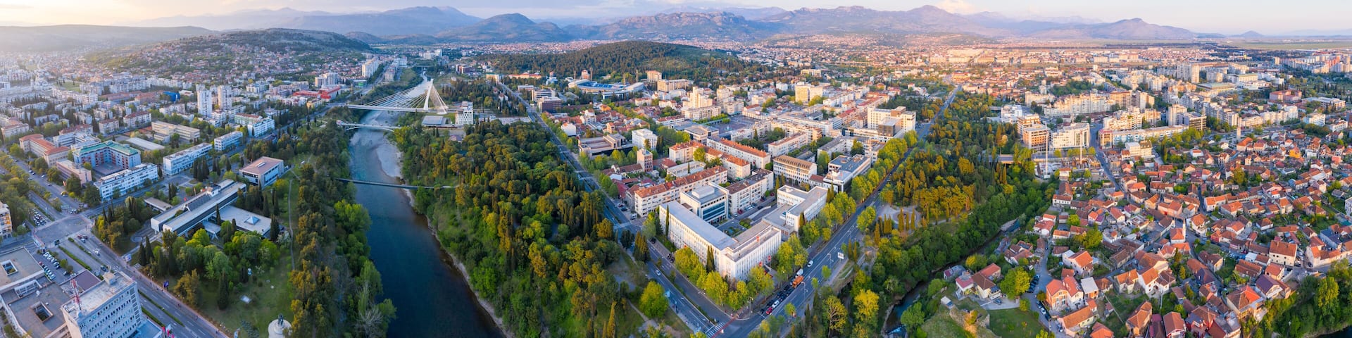 Podgorica, capital of Montenegro: panoramic aerial view. The city is renowned for its green parks. This small country is located on the Balkans peninsula on the Mediterranean, in South Eastern Europe.