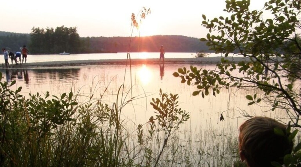 One of my favorite shots. My son watching a group of local fishermen at sunset on Maine's Sebago Lake.