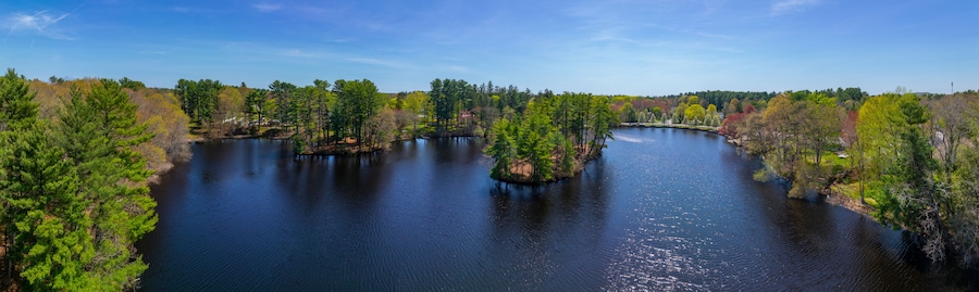 Johnson Pond aerial view on Forge River in spring at the historic center of Raynham, Bristol County, Massachusetts MA, USA.