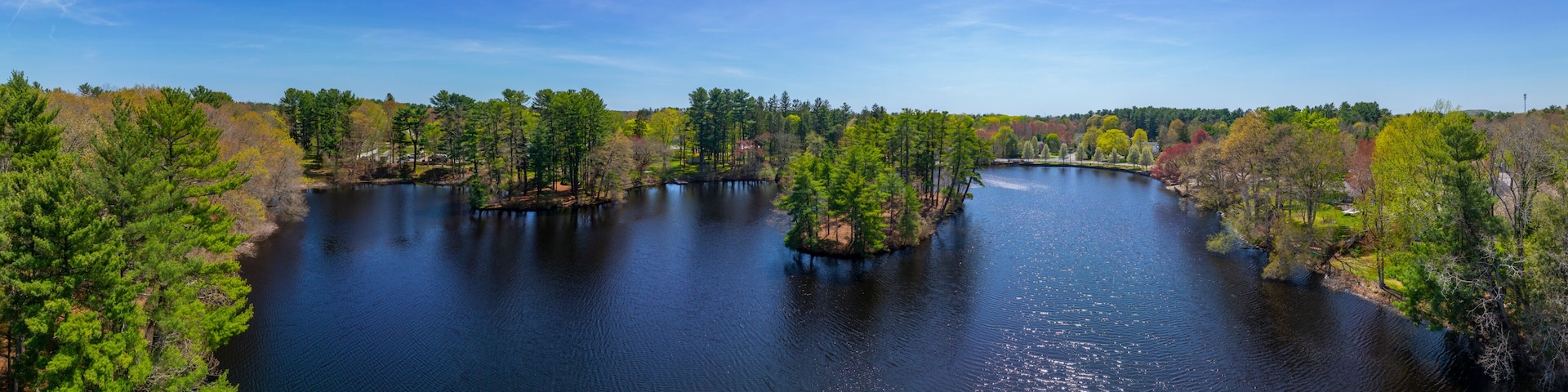 Johnson Pond aerial view on Forge River in spring at the historic center of Raynham, Bristol County, Massachusetts MA, USA.