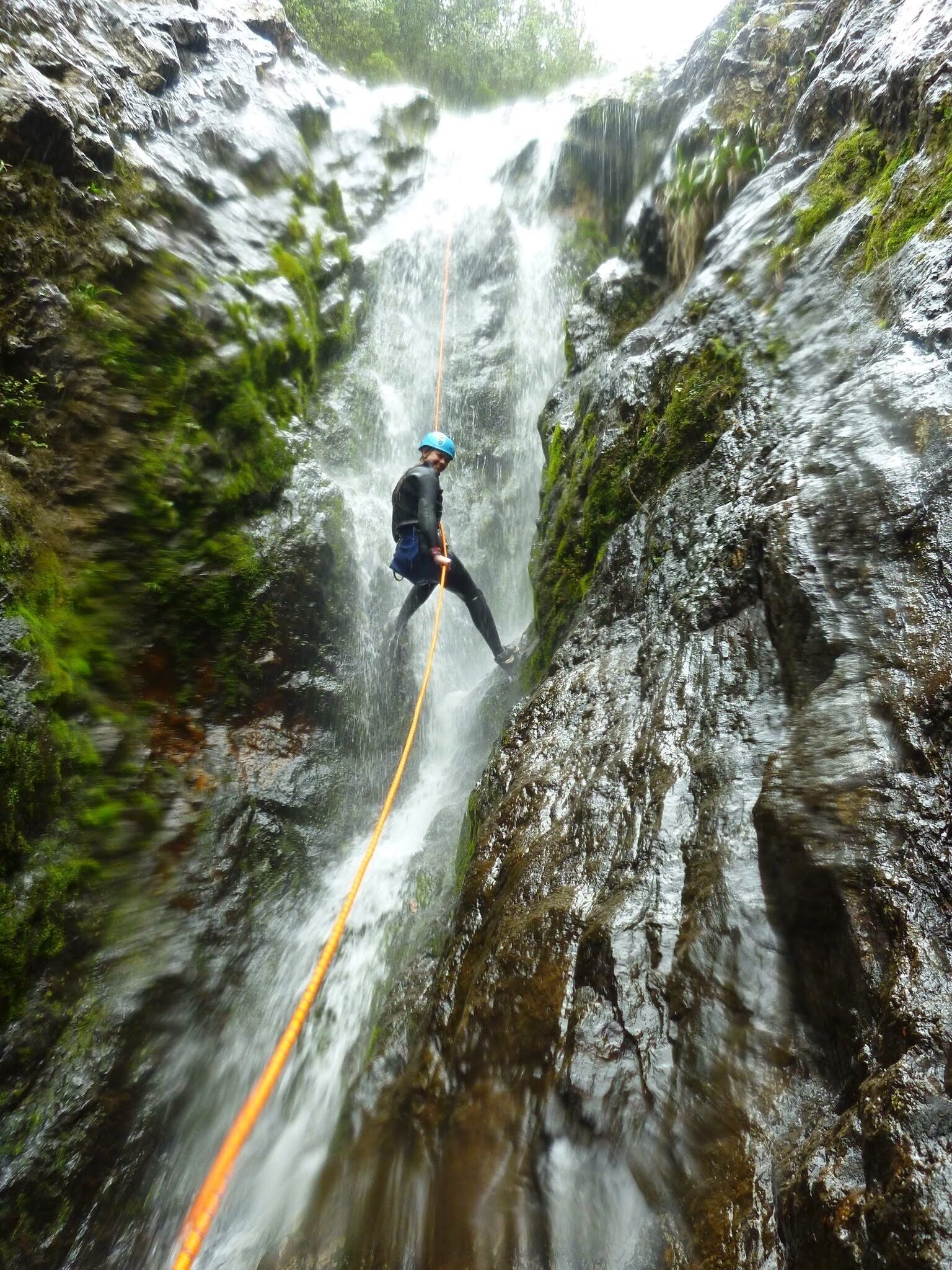 Canyoning down the Sleeping God Canyon in Thames. 